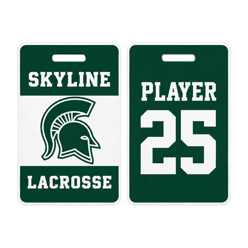 Skyline Spartans green and white bag tag with Spartan helmet on one side and sample name and number on the other